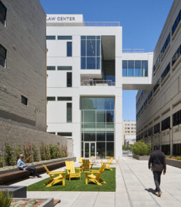 University of California Hastings College of Law showing students walking and relaxing.