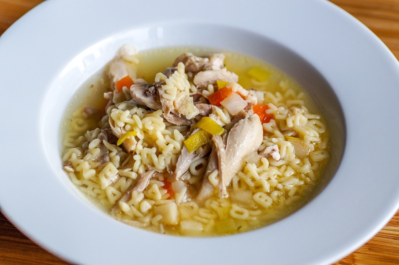 Chicken soup with vegetable noodles.