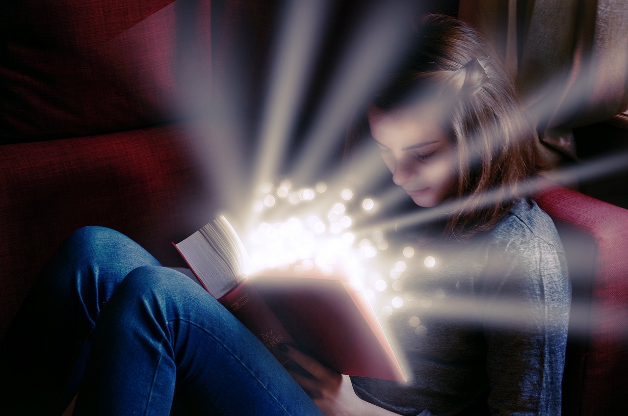 A girl entering the magical realm of a book.