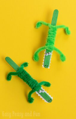 Craft Stick Alligator Craft For Kids to Make Make an alligator from pipe cleaners and craft sticks.